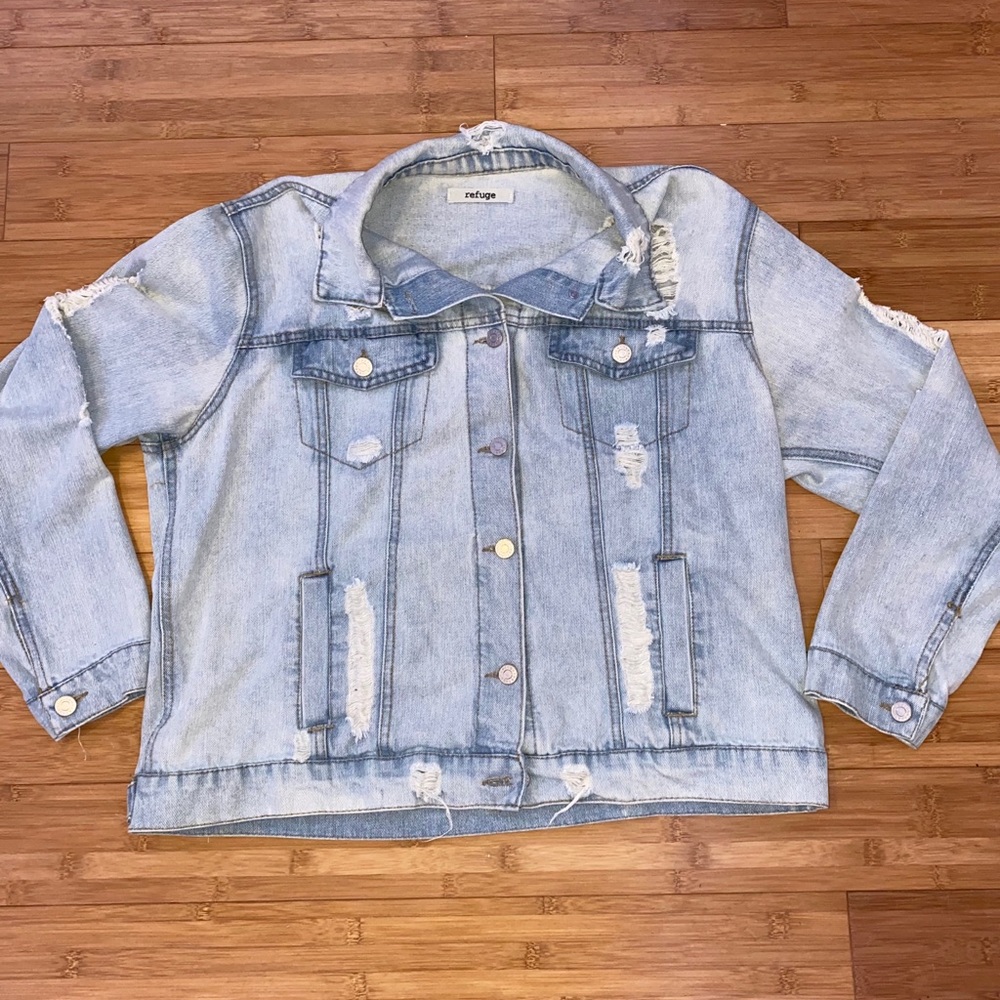 Ripped jean jacket.